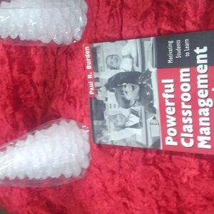 Book " Powerful classroom management strategies" .